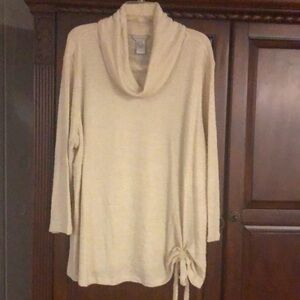 Beautiful light weight top. It will be perfect for spring. New with tags.